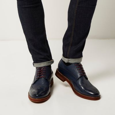 Navy blue pebbled leather brogues